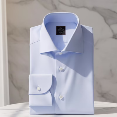 Light Blue Royal Oxford Dress Shirt Mens by Panache Bespoke, crafted from luxury Giza cotton with visible Oxford weave texture, wide spread collar, French placket, round cuffs, and refined formal tailoring.